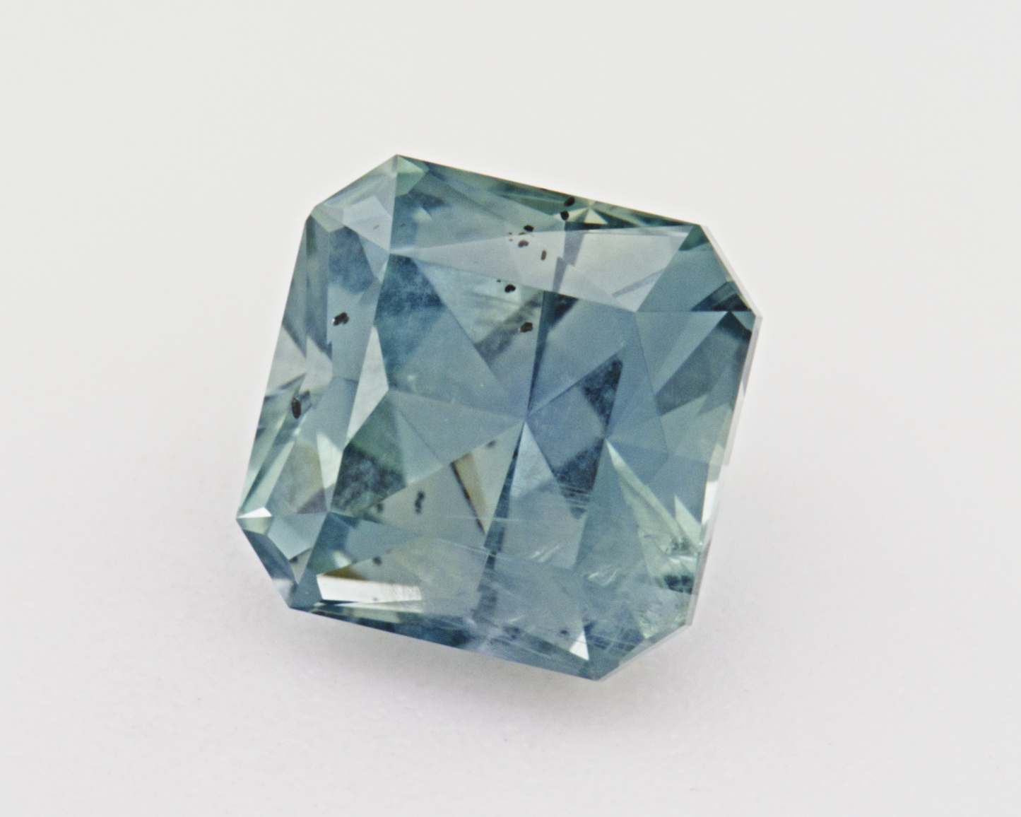 1.26 carats natural teal Montana Sapphire - emerald shape