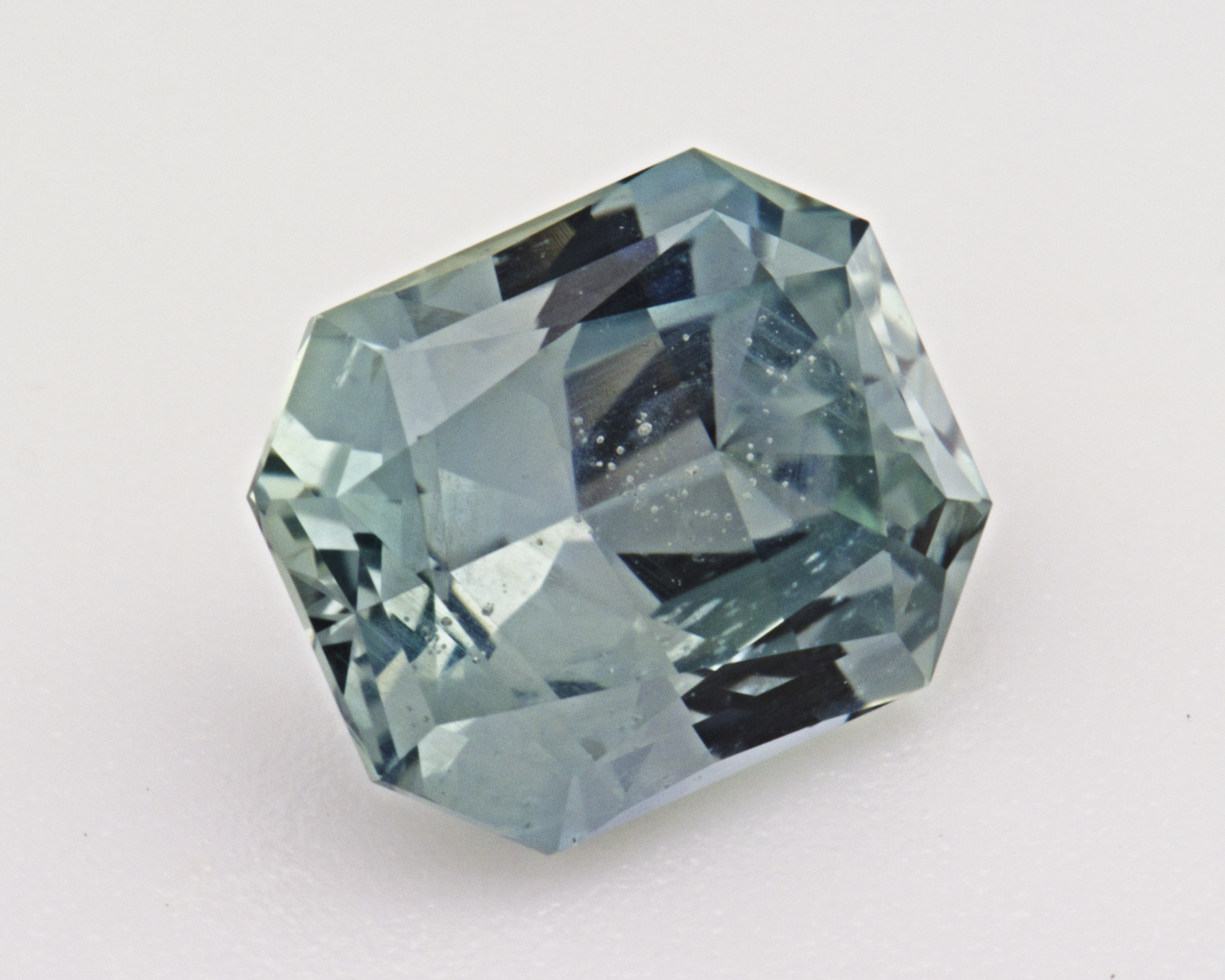 1.73 carats natural teal Montana Sapphire - emerald shape