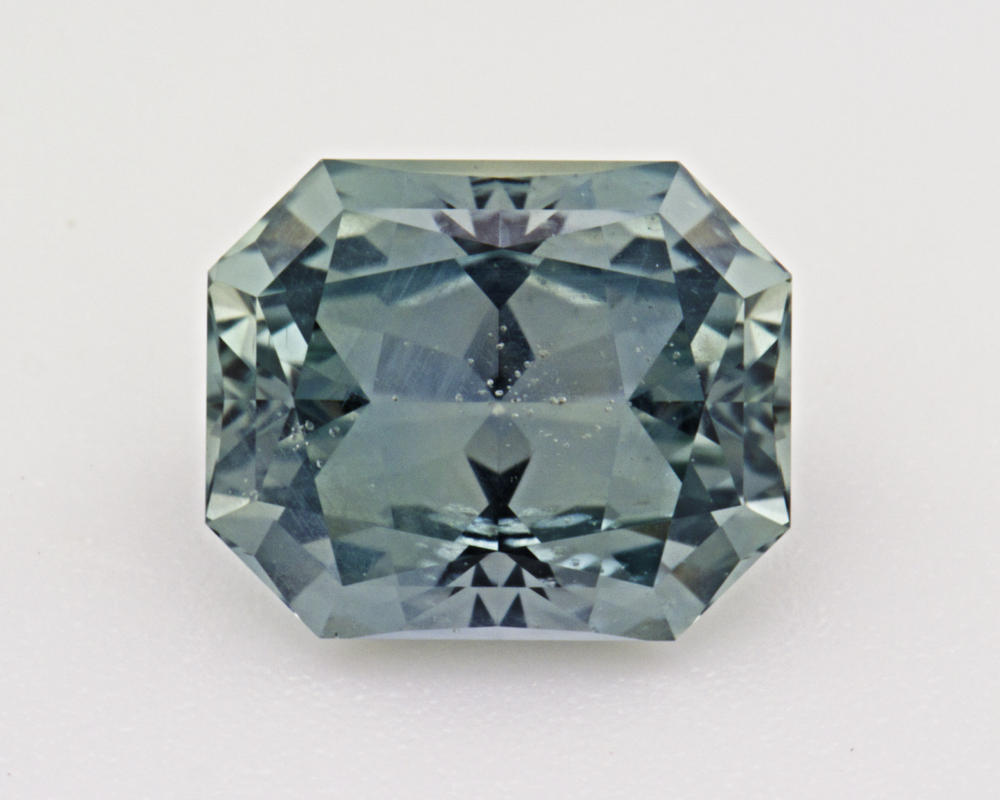 1.73 carats natural teal Montana Sapphire - emerald shape