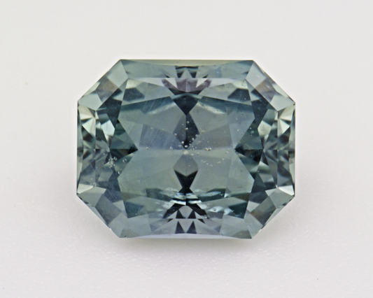 1.73 carats natural teal Montana Sapphire - emerald shape