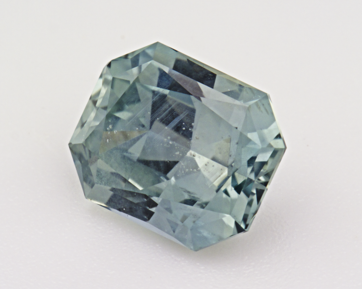 1.73 carats natural teal Montana Sapphire - emerald shape