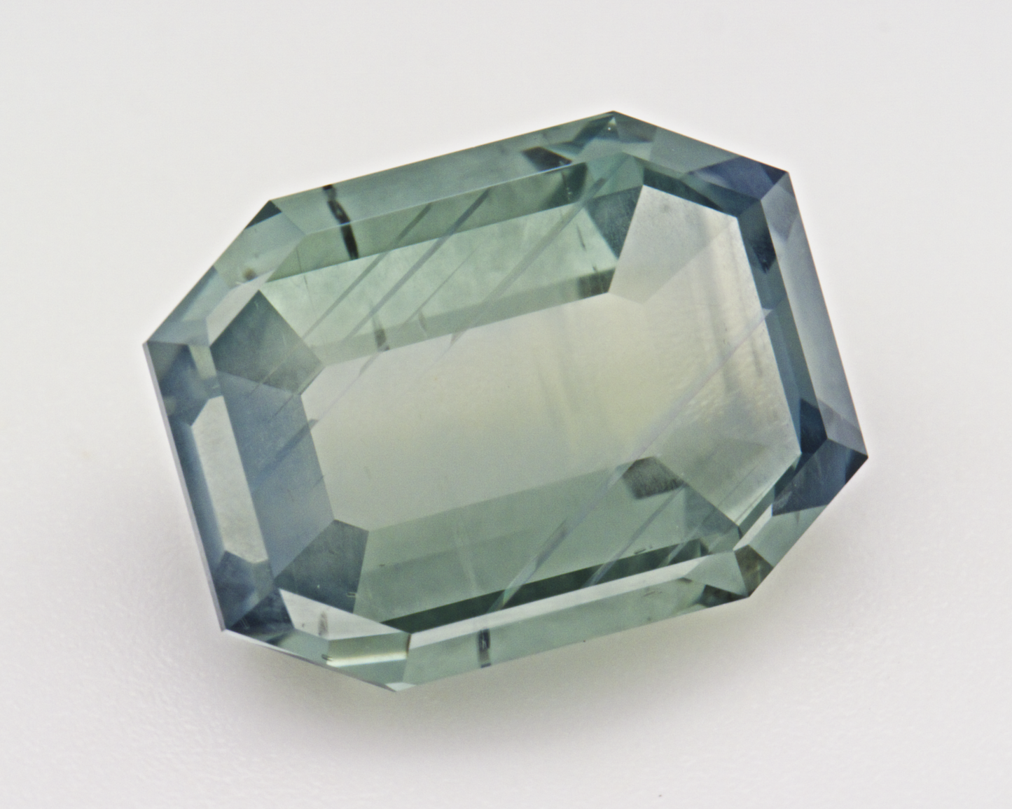 4.96 carats natural teal Montana Sapphire - emerald shape
