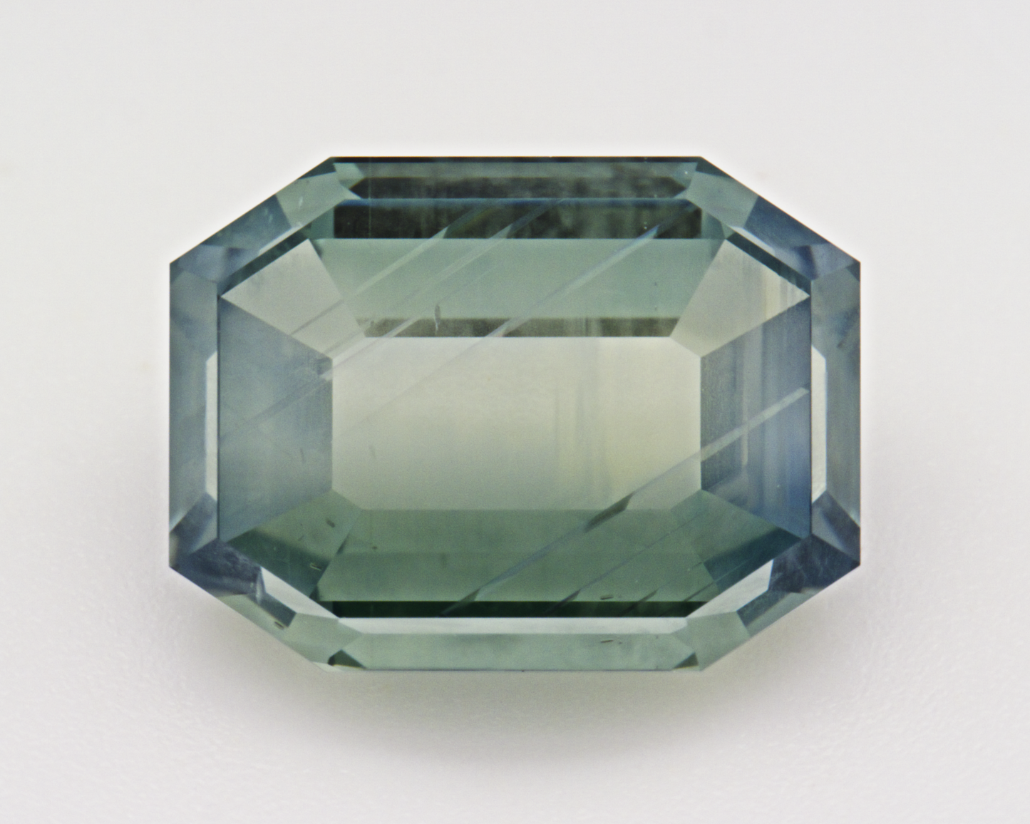 4.96 carats natural teal Montana Sapphire - emerald shape