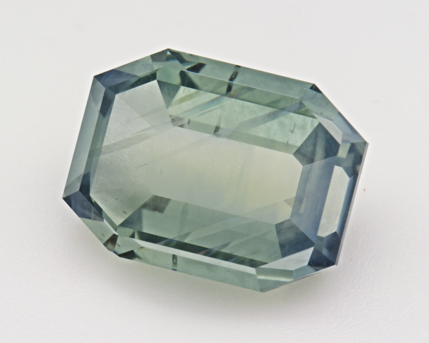 4.96 carats natural teal Montana Sapphire - emerald shape