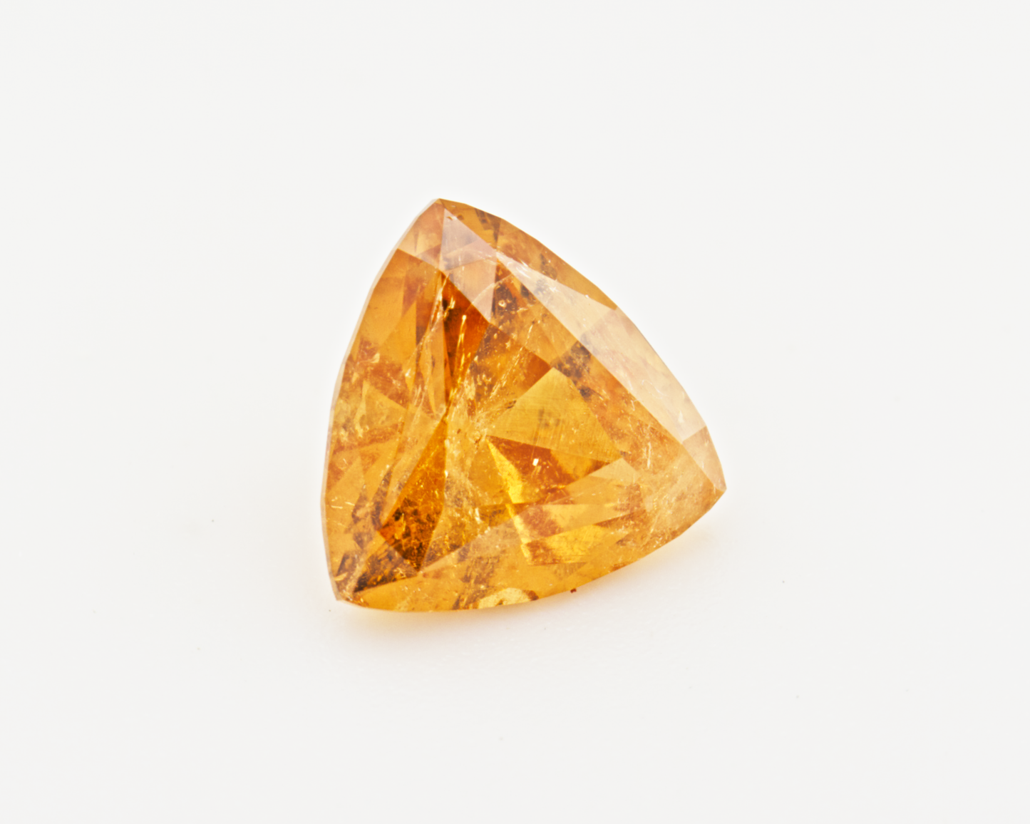 1.70 carats orange San Diego Garnet _ trillion shape