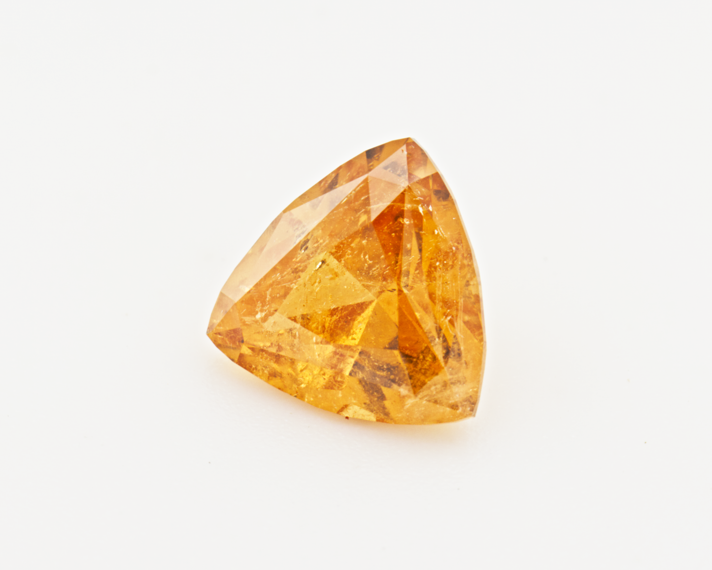 1.70 carats orange San Diego Garnet _ trillion shape