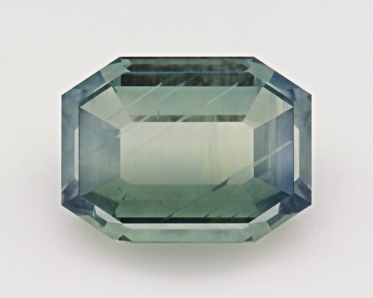 4.96 carats natural teal Montana Sapphire - emerald shape